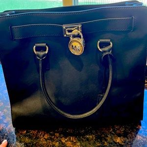Brand new Michael kors bag.  Used once.